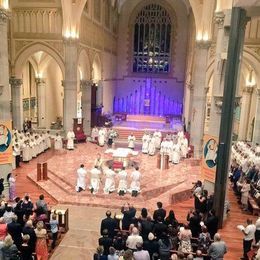 Archbishop Tim Costelloe lays hands on Jerome, Giovanni, David, Rodrigo & Matthew