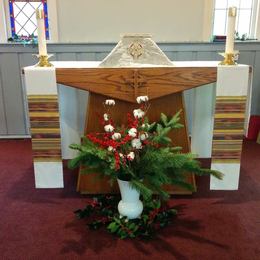 Christmas altar flowers for the 8 pm service