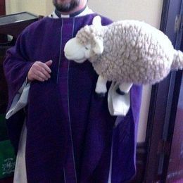 Rev. Eric Morin with Barbaraaa the sheep