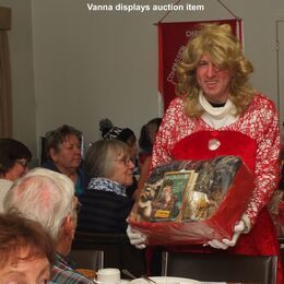 St. John’s Loonie Auction 2016 - Vanna displays auction item