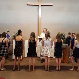 14 Confirmands affirm their Baptism