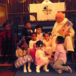 Pastor with the children during Easter Service.