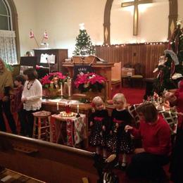 Christmas 2014 - Bell 'choir' leading jingle bells with the Sunday School leading the singing