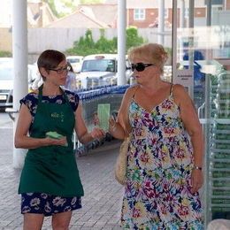 Handing out the Foodbank shopping list